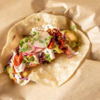 Shrimp Taco · salsa verde, red cabbage, pico de gallo cumin sauce, hot red sauce on a made from scratch, f...