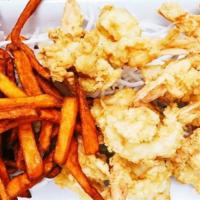 Lightly Breaded Jumbo Shrimp (11 Pcs.) · Crispy fried lightly breaded jumbo shrimp with your choice of two side dishes and choice of ...