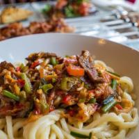 Homemade Laghman · On-the-spot, hand-pulled noodles topped o with various combinations of vegetables. (lamb/chi...