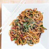 Gam Bian Soman · Hand pulled fried noodles, sauteed with seasoned vegetable and homemade sauces topped with s...