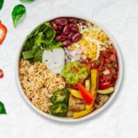 Veggie Mixer Bowl · Mixed vegetables over a bed of rice.