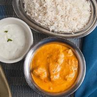 Chicken Korma · Boneless chicken cooked with cream and almond, sweet spicy.