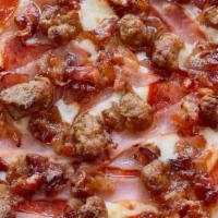 Meat Lovers Pizza (Tre) · Pepperoni, ham, bacon, sausage, marinara sauce, and mozzarella cheese.