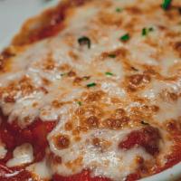 Cheese Manicotti  · Four cheese blend rolled in fresh pasta and oven baked with marinara sauce.