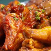 Wings · 10 full wings. Choice of sauce: buffalo, mild, spicy asian, honey hot, nashville hot, cajun ...