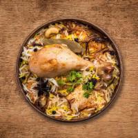 Yum Chicken Biryani · Our long grain basmati rice cooked with chicken marinated in yogurt and house spices fresh v...