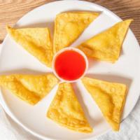Crab Rangoon · Fried cheese wontons with a crab meat filling