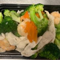 Steamed Jumbo Shrimp With Broccoli · Sauteed with sauce on the side served with brown rice or white rice.