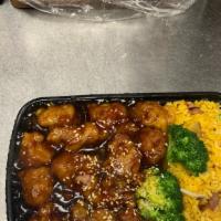Sesame Chicken Combination Platter · Served with pork fried rice and egg roll or soup.