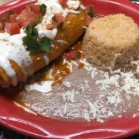 Chimichangas · Choice of meat, choice of sauce, stuffed with Oaxaca cheese, served with rice, refried beans...