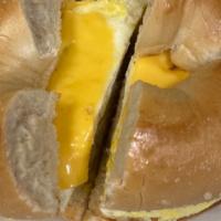 Egg & Cheese (American) · Scrambled fresh egg and American cheese on your favorite toasted bagel