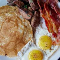 The Big 'Bud · 2 buttermilk pancakes, 2 eggs your way, bacon, home fries