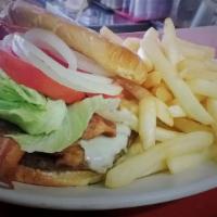 Sam'S Burger · Comes with 1 over medium egg, ham, bacon, lettuce, tomatoes, onions, pickles, and french fri...