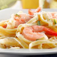 Shrimp Alfredo Pasta · Grilled shrimp, broccoli and alfredo sauce. Served with fresh garlic bread and choice of zit...