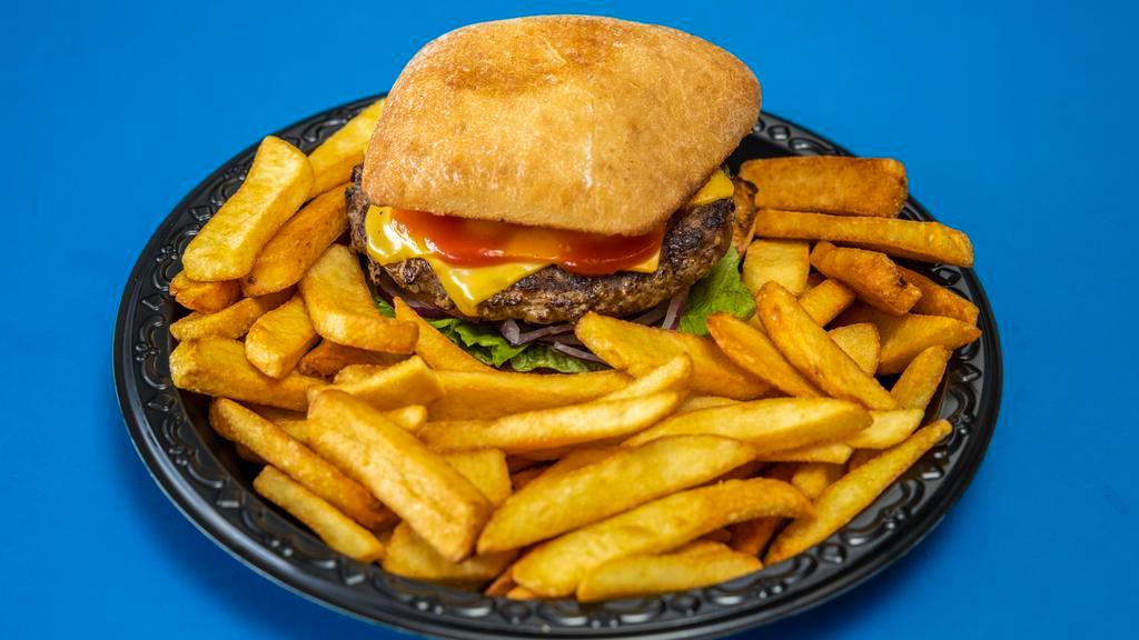1/2 Lb Cheeseburger Dinner · Served with choice of two: rice, French fries, onion rings, curly fries, steak fries, coleslaw or salad.
