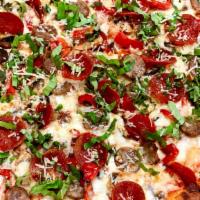 Pizza De La Casa · Sweet Italian sausage with fresh white mushrooms, roasted red bell peppers, roasted garlic, ...
