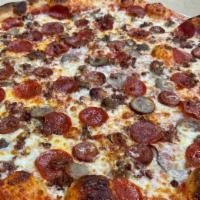 * Mighty Meat Lover Pizza · Imported ham, meatball, sweet Italian sausage, pepperoni, linguica, bacon and mozzarella.