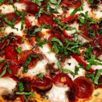 * Meatball And Margherita Pizza · Meatball, pepperoni, roasted red peppers, fresh basil and fresh mozzarella.
