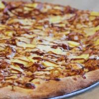 Bbq Chicken And Friends Pizza · Smoked Gouda, grilled pineapple and Canadian bacon basted in our homemade BBQ sauce with moz...