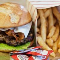 * David'S Bacon Burger · All-natural Angus burger broiled with bacon, lettuce, onions and tomatoes. Served with Frenc...