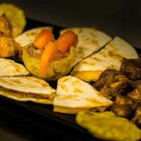 Sampler · Fried pork, fried chicken breast nuggets, fried plantains, choice of chicken or pork quesadi...