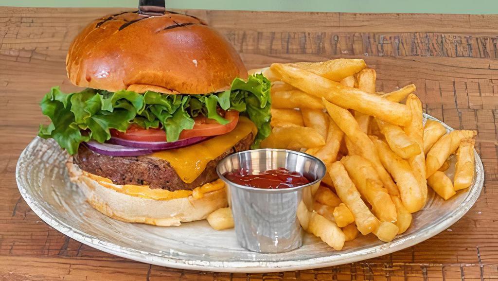 Cheese Burger · 1/2 pound patty, Cheddar cheese, lettuce, tomato, onions, spicy truffle aioli, on a brioche bun, side of fries