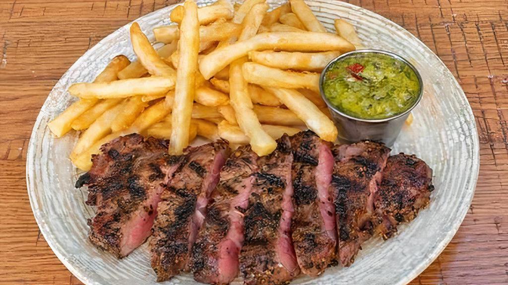 Y. Strip Steak · 10oz Black Angus NY Strip, gaucho seasoning, french fries, chimichurri sauce.