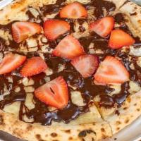 Nutella Pizza · 12'' pie, topped with sweet mascarpone cream, Nutella, and fresh strawberries.