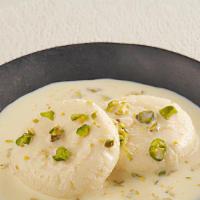Rasmalai · Made from home made cheese soaked in clotted cream flavored with cardamon