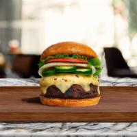 Jalapeno Burger · American beef patty topped with melted cheese, jalapenos, lettuce, tomato, onion, and pickle...