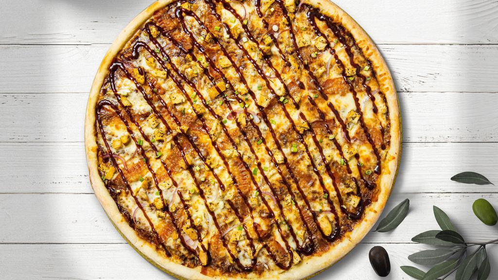 Bbq Chicken Pizza · Chicken, BBQ sauce, bacon and mozzarella baked on a hand-tossed dough.