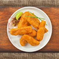 Buffalo Tenders · Chicken tenders breaded and fried until golden brown before being tossed in buffalo sauce.
