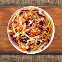 Cole Slaw · (Vegetarian) Shredded cabbage and carrots dressed in mayonnaise and apple cider vinegar.