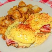 #6. Jd'S Eggs Benedict · on toasted English muffin, choice of ham, Hash or Spinach, two poached eggs, cheddar cheese ...