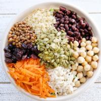 Protein Bowl · Kale base, quinoa, lentils, beans, chickpeas, brown rice, carrots, pumpkin seeds, and raisin...
