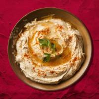 Hummus Appetizer · A blend of chickpeas and our signature tahini sauce, cold dip is then drizzled in olive oil ...
