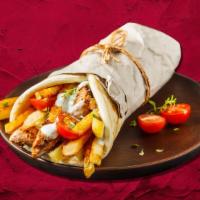 Gyro Special Wrap  · Char grilled lamb and beef meat wrapped with pita bread, tzatziki, tomatoes, onion and lettuce
