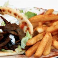 Gyro Platter · With french fries and Greek salad.