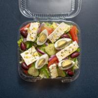 Greek Salad · Garden salad with feta cheese, black olives and egg.
