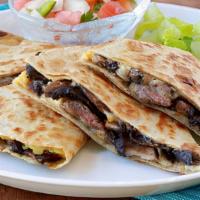 Steak Quesadilla · Served with salsa and sour cream.