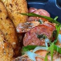 Voodoo Shrimp · Shrimp & Alligator Chorizo, served in a . Shrimp Broth