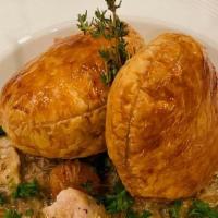 Chicken Pot Pie · Chicken, Peas, Carrots, Herbs, Creamy Chicken Gravy, topped with a Fluffy Puff Pastry