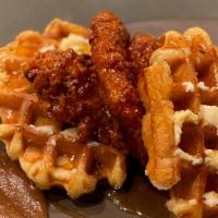 Fried Chicken & Waffles · House-Fried Chicken topped with Honey Hot Sauce, Belgium Waffles, Honey Butter, Bourbon Appl...