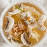 Gyoza Soup · Clear soup with gyoza.