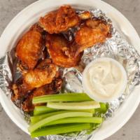 Boneless Wings · Hot, Mild, Honey BBQ, General Tso’s. Served with a side of celery & blue cheese or ranch.