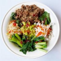 Vegan Impossible Bulgogi Salad · Impossible bulgogi, mixed greens, spinach, kale, guacamole, bean sprouts, pickled radish, ch...