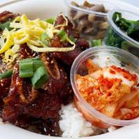 La Galbi Rice Bowl · Beef short ribs marinaded in our sweet-soy glaze, served with white rice, side of kimchi, st...