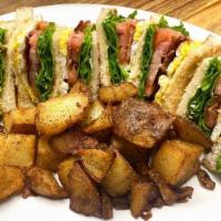 Club Breakfast Sandwich · 3 decks high with egg, bacon, lettuce, tomato, and mayo served with home fries.