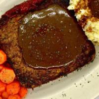 Meatloaf Dinner · Individual box with our homemade MEATLOAF served with carrots, Mashed potatos and gravy.