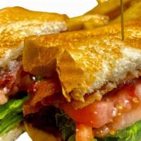 L.T. Sandwich · Sandwich with Bacon,Lettuce & tomato . Served with chips and a pickle. Substitute fries or o...